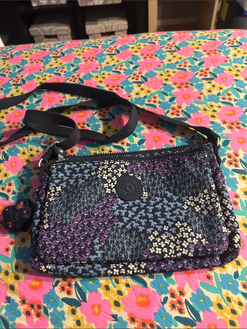 Kipling Navy Floral Pattern Crossbody Bag with Purple Accents